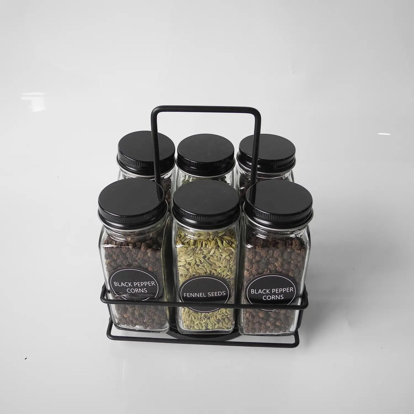 Revolving black glass storage salt spice jars
